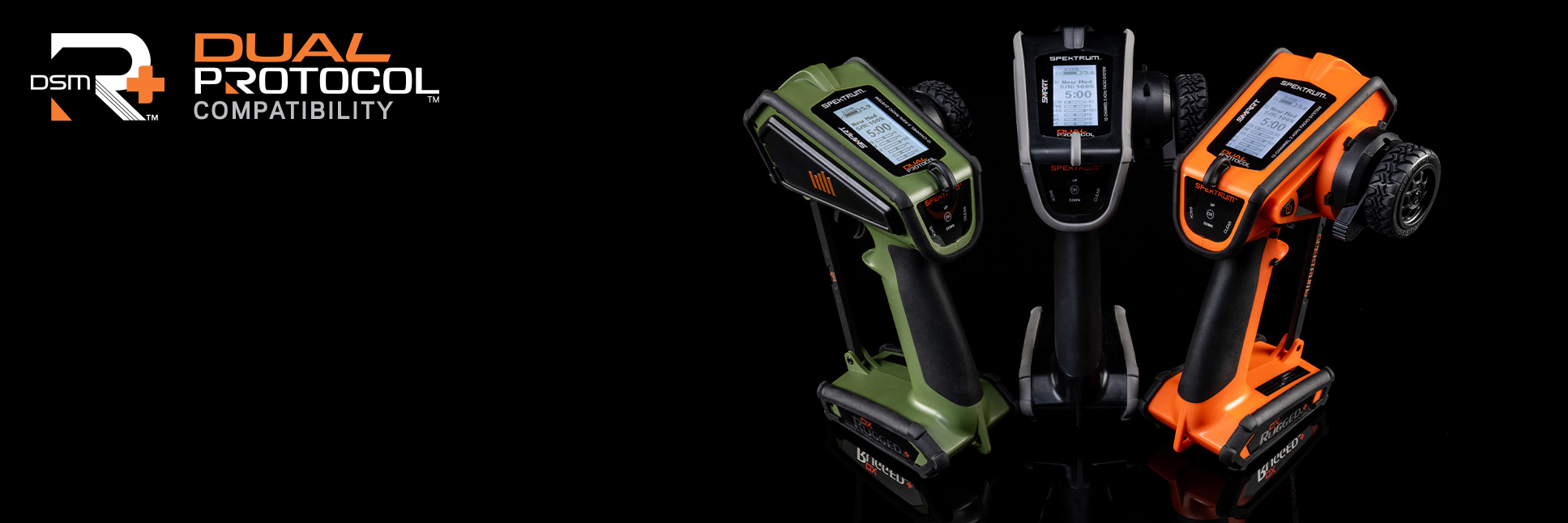 Glamour shot of the Spektrum DX Rugged+ 12-Channel DSMR+ Transmitters on a black background with the DSMR+ and Dual Protocol Logo